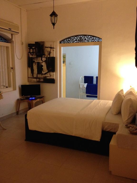 Fire Dragon Hideaway Hotel Negombo Quarto foto